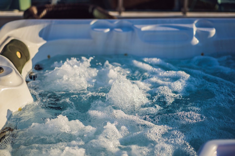 Hot tub with bubbling water showing energy-efficient spa comfort in Santa Rosa CA.