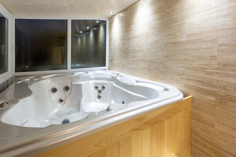 An empty indoor hot tub